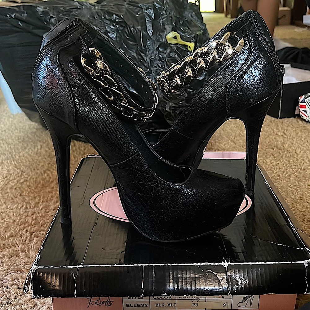 Black heels with gold straps